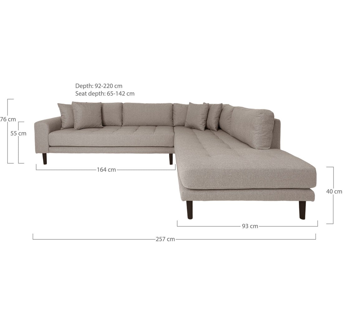  facing right in stone with four cushions and black wooden legs