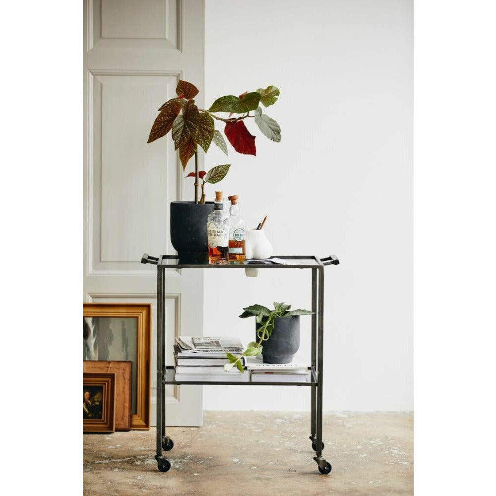 Nordal TONE roller table in iron with black glass shelves - 73x41 cm - grey/black